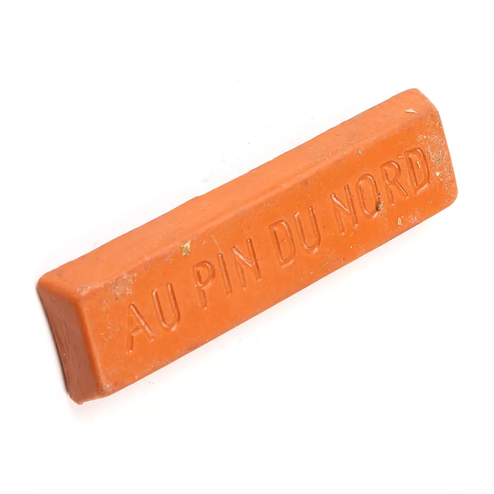 Baton de cire teinte bois de rose...